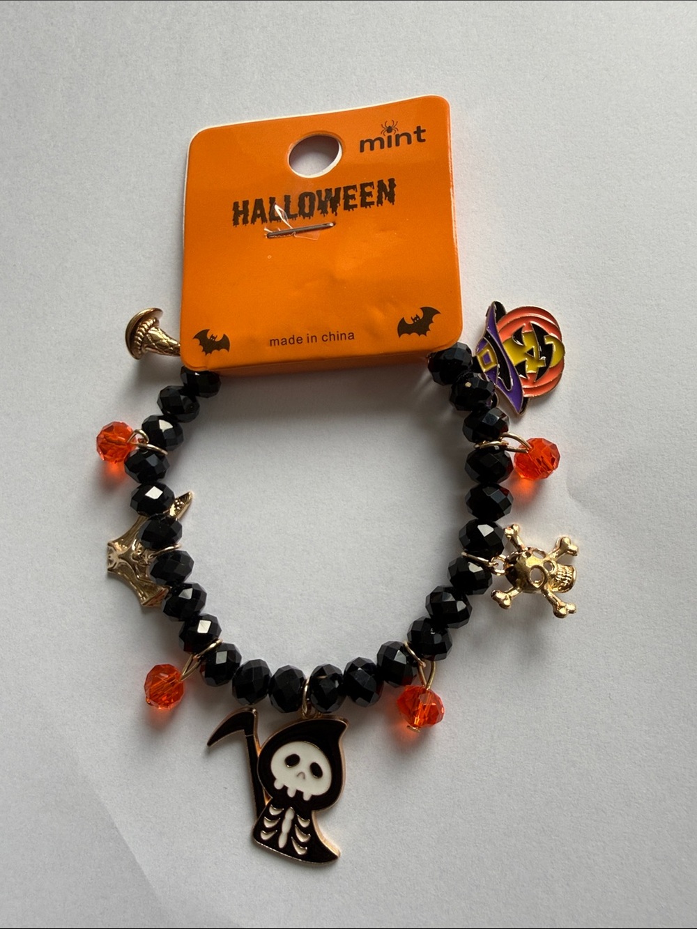 NWT Mint Halloween Stretch Charm Bracelet with Black Beads & Orange Crystals.